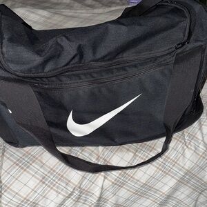 Nike Black Duffel with White Swoosh Logo